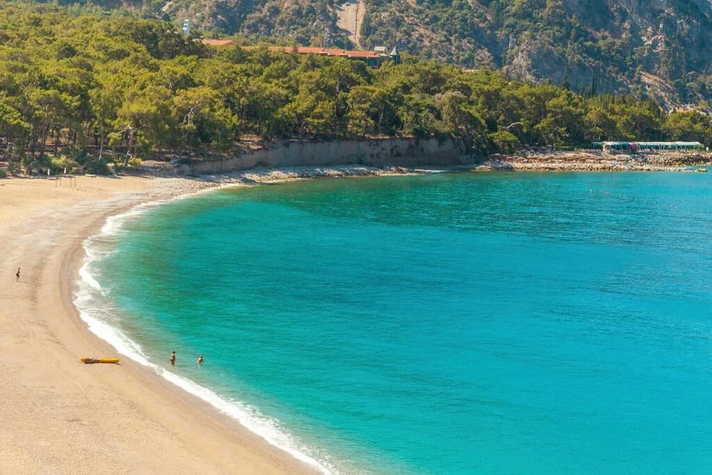 Kıdrak Beach near Ölüdeniz with pine forest, clear sea and a quieter natural beach setting