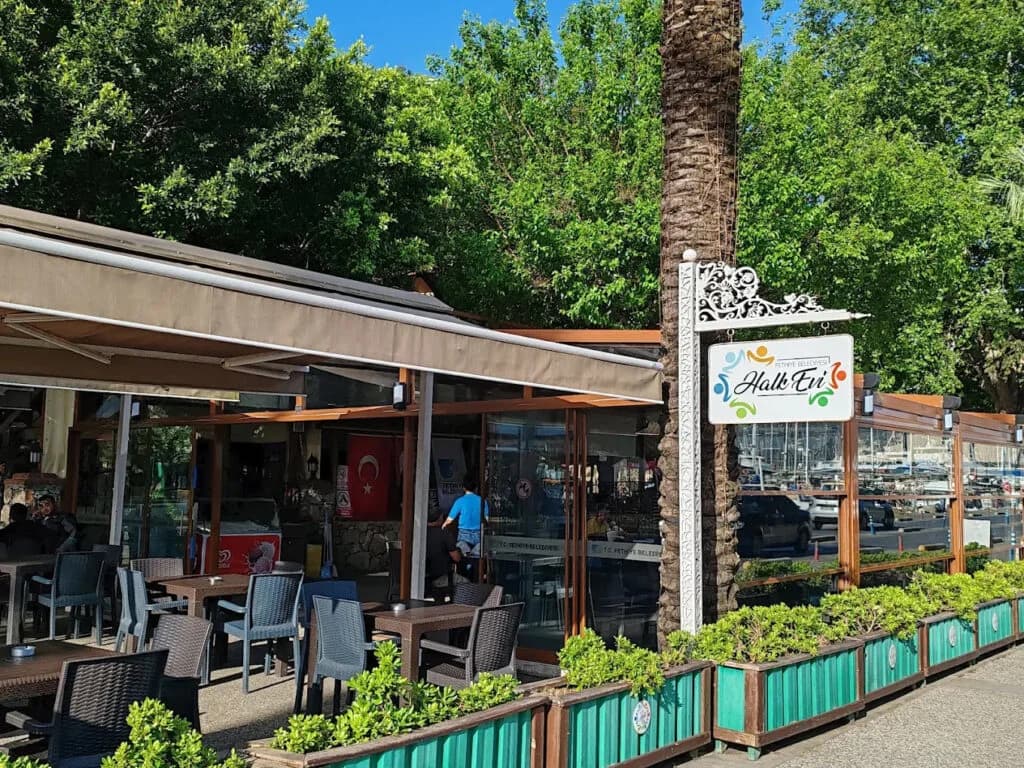 Customers sitting outside a municipality-run Halk Evi café in Fethiye