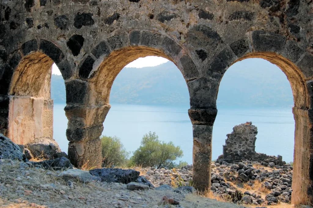 Rock-cut cisterns and terrace walls on the slopes of St Nicholas Island