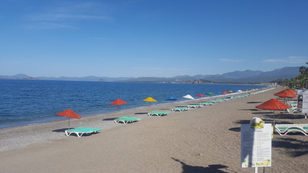 Calis Beach, Fethiye: Water, Sunset, Transport & Local Tips 1 Long shoreline and Mediterranean sea at Calis Beach Fethiye
