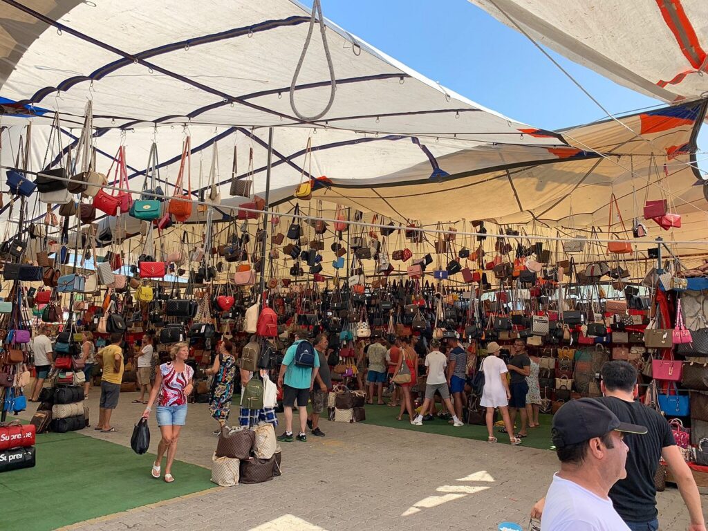 Fethiye Tuesday Market: What to Buy, Best Time to Visit & Local Tips 1 Selection of handbags and textiles at Fethiye Tuesday Market