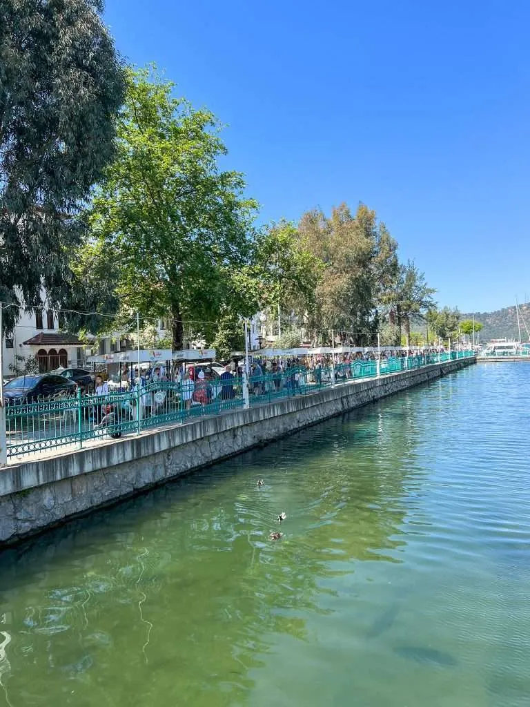 Fethiye Tuesday Market: What to Buy, Best Time to Visit & Local Tips 5 Scenic canal path leading to Fethiye Tuesday Market