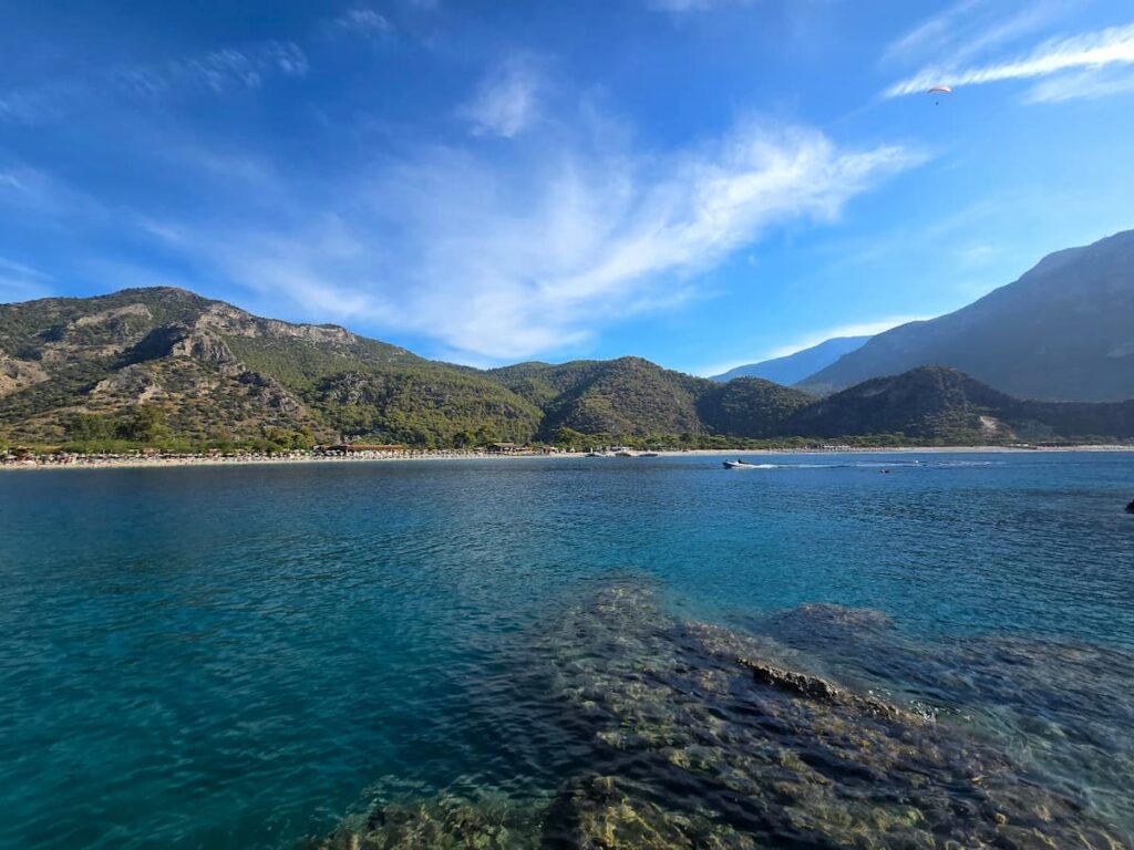 Ölüdeniz & Blue Lagoon Guide 2026: Beach Tips & Transport 4 View of Ölüdeniz Blue Lagoon and surrounding coastline near Fethiye