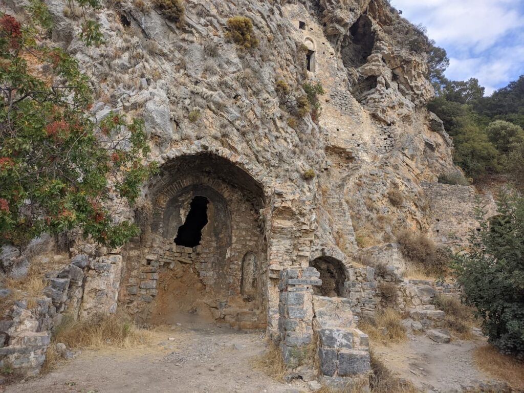 Afkule Monastery cliffside ruins above Soğuksu Bay near Kayaköy
